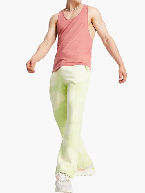 ASOS ASOS DESIGN co-ord jersey flared joggers in green tie dye - PURPLE