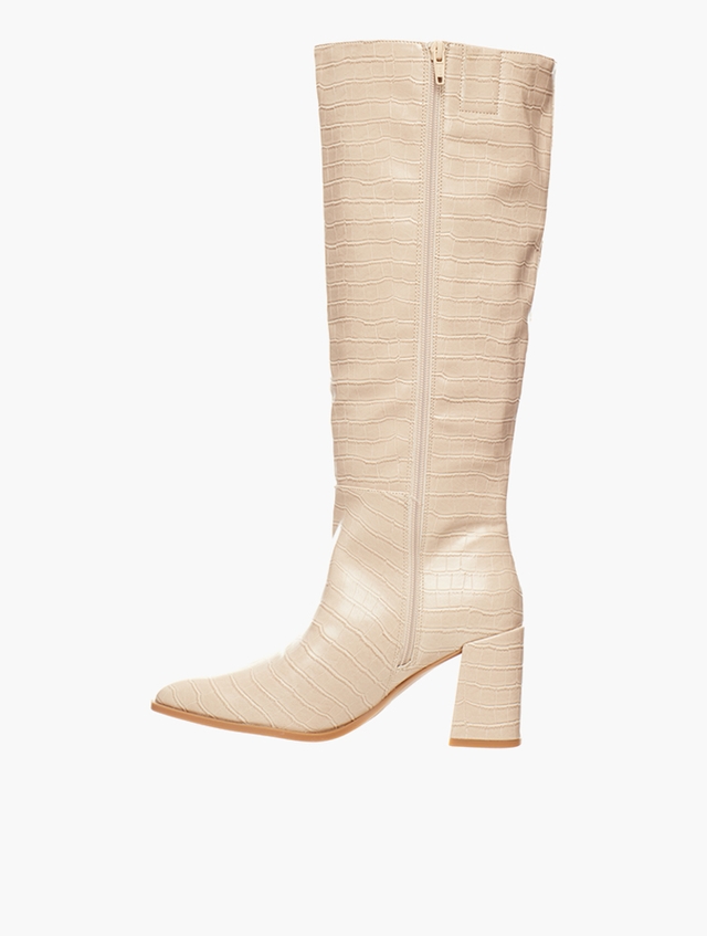 Shop Daily Finery Cream Knee High Heeled Boots for Women from MyRunway ...